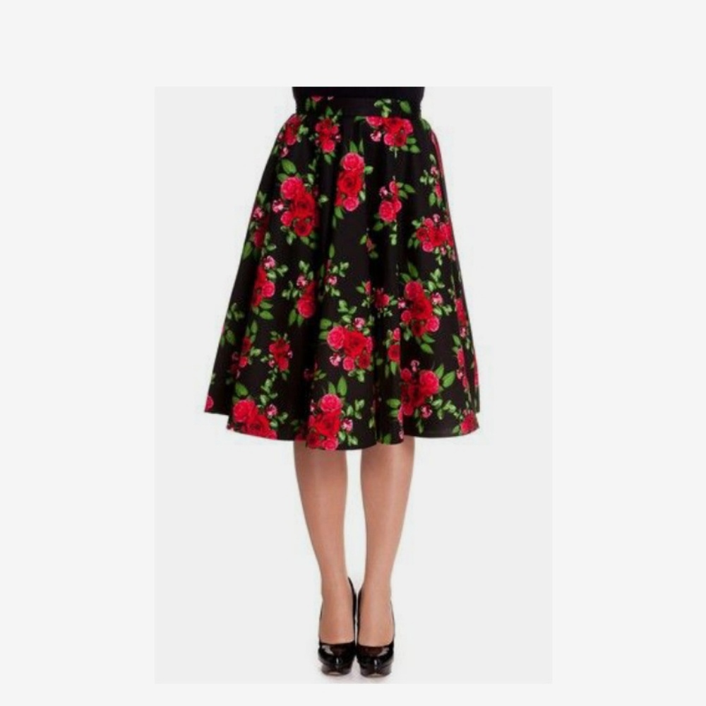 Flare skirt, red rose print, past knee length.
